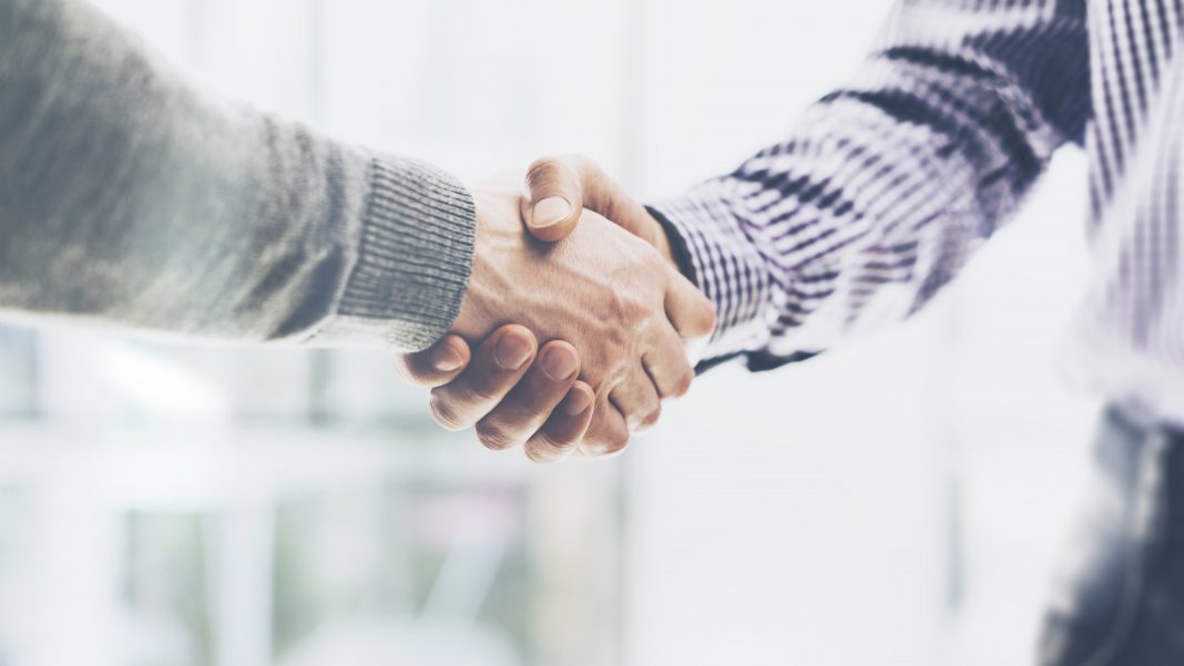 Hands shaking, showing an agreement has been made