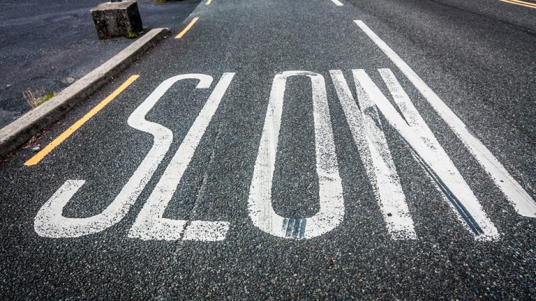 Slow road sign