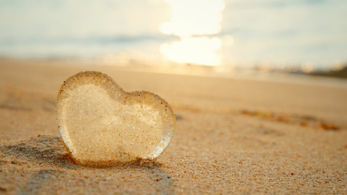 Love heart in sand