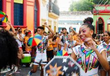 PopOK Gaming: tapping into the cultural heartbeat of Brazil People celebrating a Brazilian carnival, part of the country's cultural heartbeat