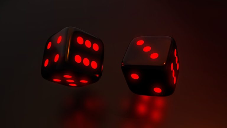 Imagem de dados pretos com vermelho neon