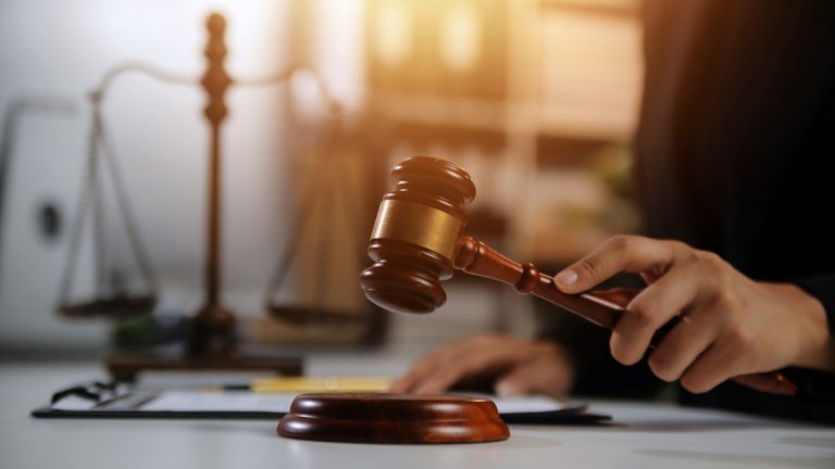 A gavel is struck indicating a decision has been made