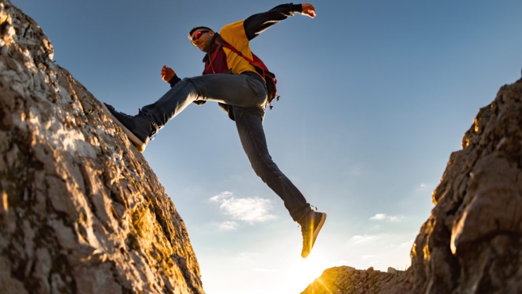 Man taking big step