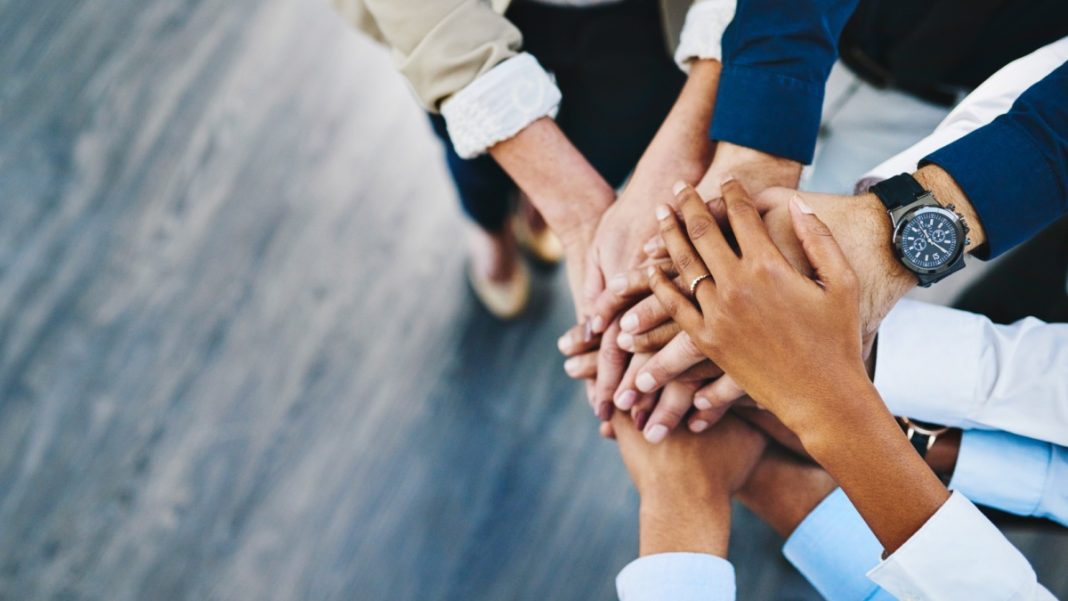 Hands together in support
