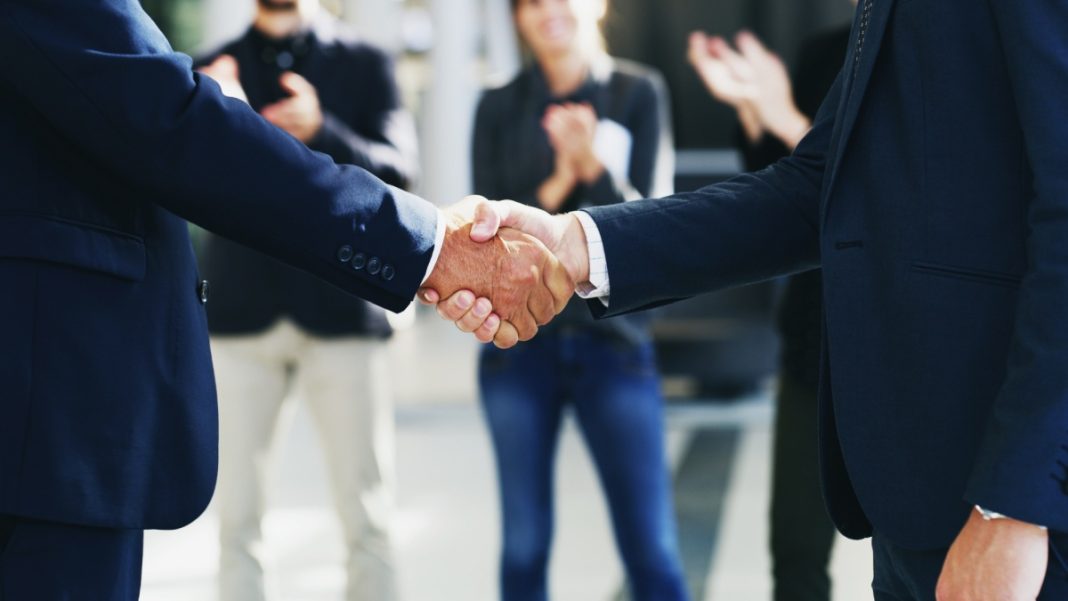 Businessmen shake hands