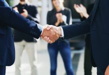 EveryMatrix adds front-end “firepower” with Goma Gaming acquisition Businessmen shake hands