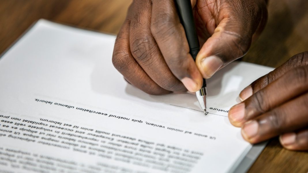 Contract being signed