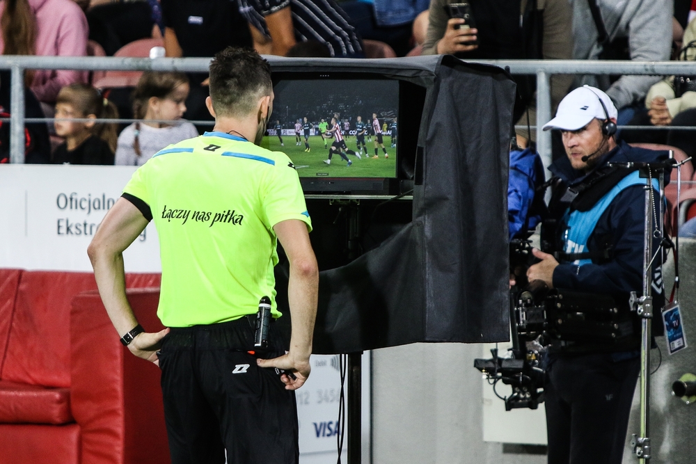 Spribe review Sweden Referee looks at a VAR screen