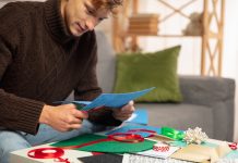 Caesars debuts first in-house slot title in New Jersey Man cutting card