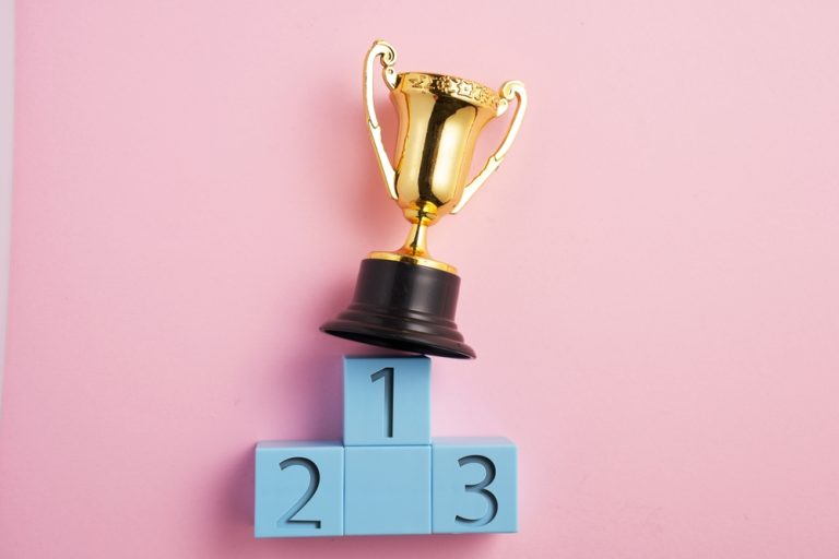 Trophy at the top of a podium