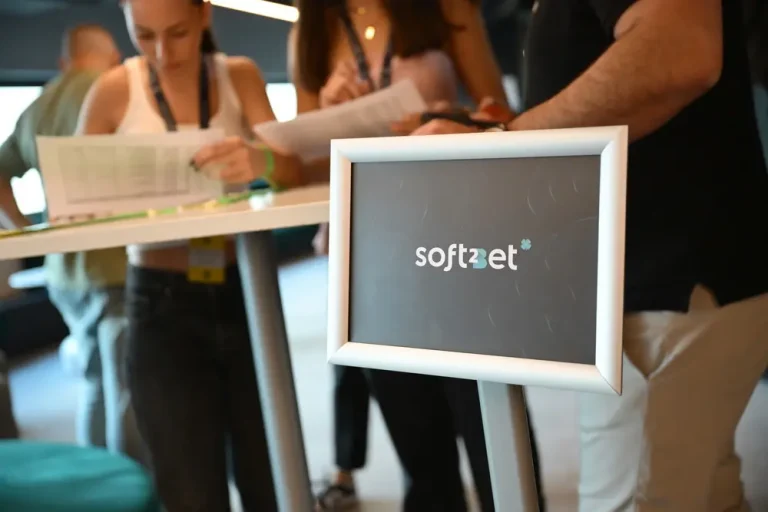 Soft2Bet logo on a stand