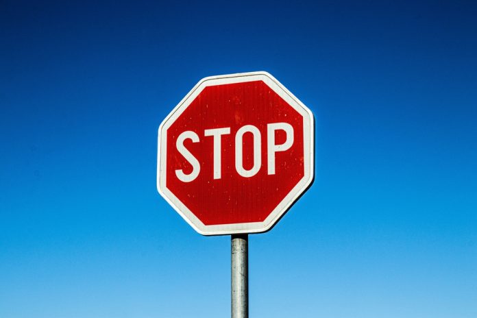 A,Red,Stop,Sign,With,Texture,And,High,Contrast,And Stop