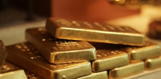Goldrush strengthens in South Africa with Amusnet Close up of gold ingots