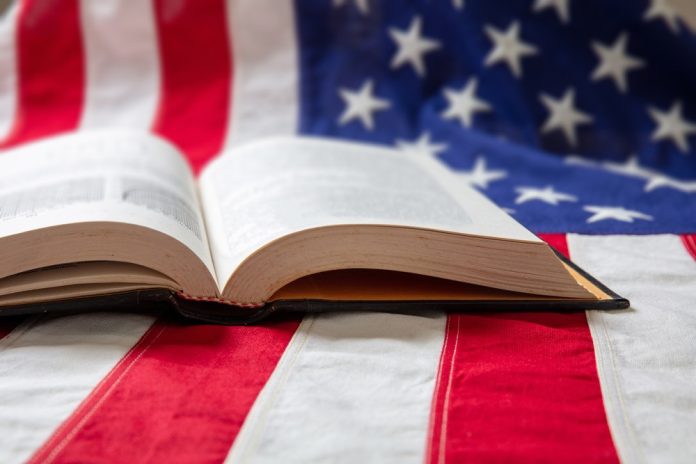 Relax-Gaming-writes-RLX-Gaming-US-story-with-ReelPlay Book on US flag